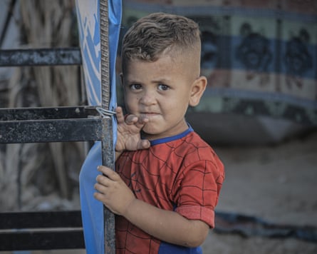 A Palestinian boy in a makeshift camp in Gaza City, 9 July 2025.
