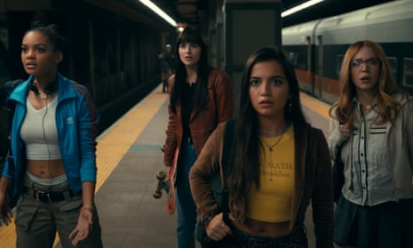 film still of four women standing on a subway platform