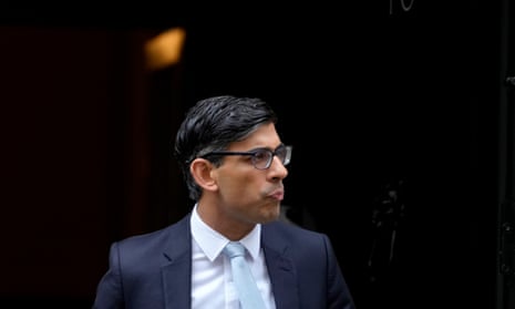 Britain's Prime Minister Rishi Sunak leaves 10 Downing Street to report at the Liaison committee in London, Tuesday, March 28, 2023. (AP Photo/Kirsty Wigglesworth)