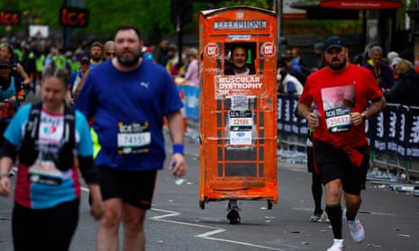 Sid Keyte dressed as a telephone box in support of Muscular Dystrophy UK runs at the London Marathon. 