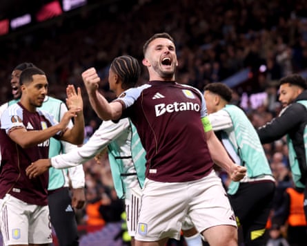 John McGinn of Aston Villa celebrates scoring his team’s third goal
