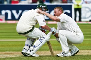 Andrew Flintoff (right) of England consoles Brett Lee (left) of Australia after England won the second Ashes Test Match by two runs at the Edgbaston cricket ground in August 2005.