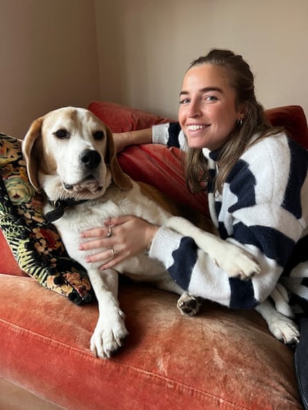 Dog on sofa with woman