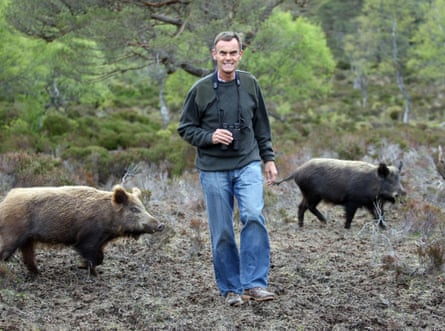 Paul Lister with wild boar introduced on to his estate in Sutherland, Scotland.