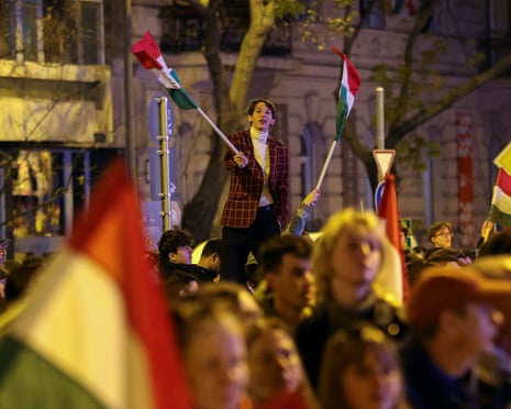 Supporters of Péter Magyar, leader of the opposition Tisza party, celebrate, after Hungarian prime minister Viktor Orbán conceded defeat in the parliamentary election, in Budapest, Hungary.