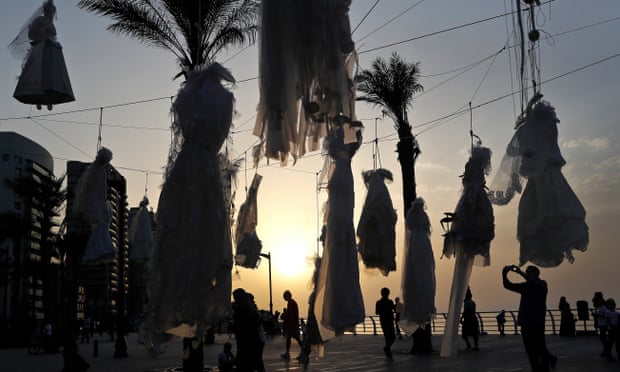 Wedding dresses displayed in Beirut as a protest against a similar law shielding rapists from prosecution.