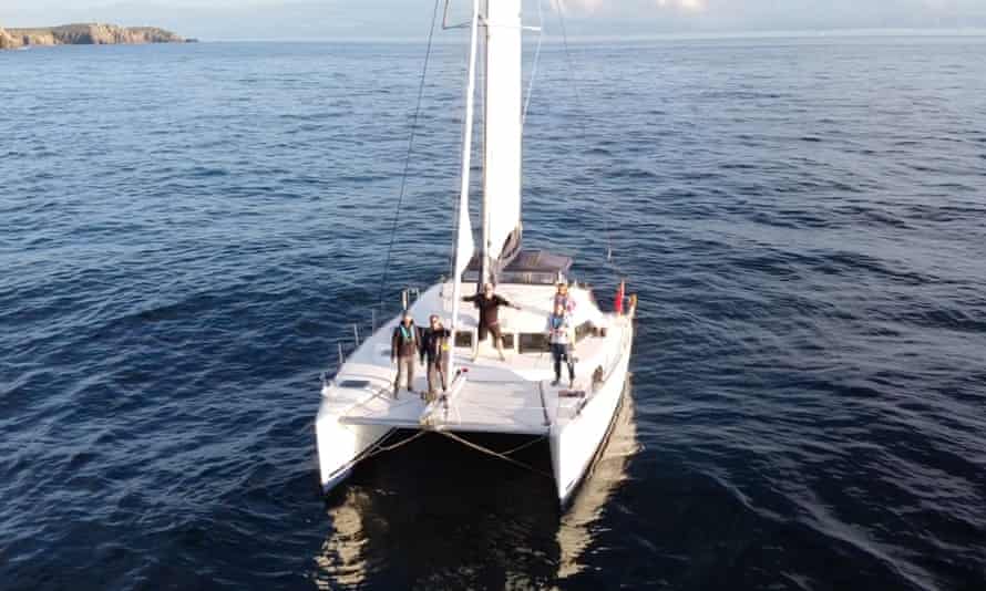Dave Erasmus and colleagues onboard their boat.