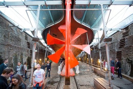 Under the ‘sea’: visitors admire the ship’s huge propeller.