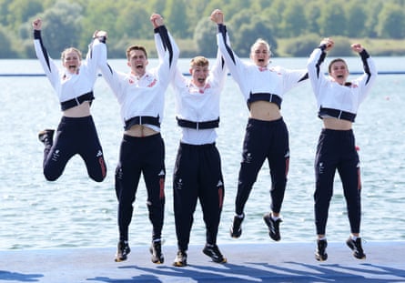 Great Britain’s Erin Kennedy, Ed FullerJosh O’Brien, Giedre Rakauskaite and Francesca Allen celebrate their gold medals in the PR3 mixed coxed fours.