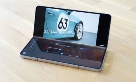 The Samsung Galaxy Z Fold 5 partly folded with flex mode playing a video on YouTube.