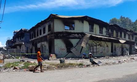 Fire damaged building two storey building on a Honiara street.