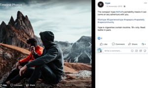 Two men hiking and having a e-cigarette break