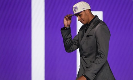 Keegan Murray walks across the stage after being selected fourth overall by the Sacramento Kings