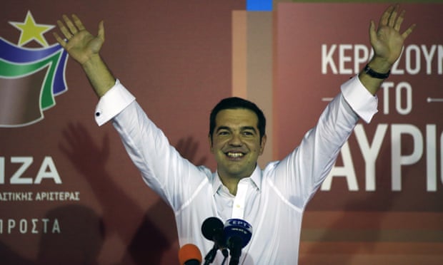 Alexis Tsipras the leader of left-wing Syriza party waves to his supporters after the election results at the party’s electoral base in Athens tonight.