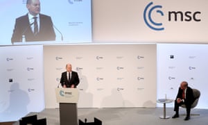 German chancellor Olaf Scholz (L) speaks as chairman of the Munich Security Conference.