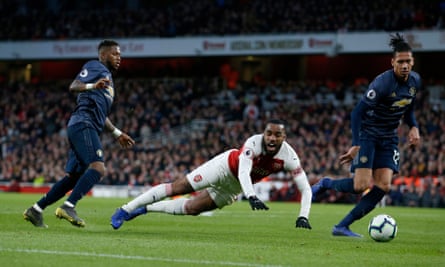 Arsenal’s Alexandre Lacazette wins the penalty which completed a 2-0 victory over Manchester United which sees the Gunners occupy fourth place over the international break.