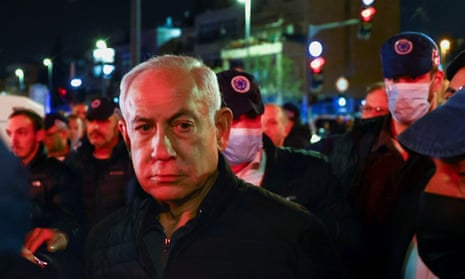 Israeli prime minister Benjamin Netanyahu visiting the scene of a shooting attack in Neve Yaacov
