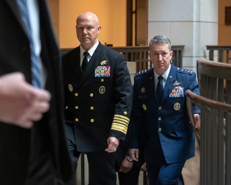 Adm Frank Bradley, accompanied by general Dan Caine, walks to a meeting with lawmakers on Capitol Hill.