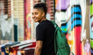 A young student walking away from the camera.