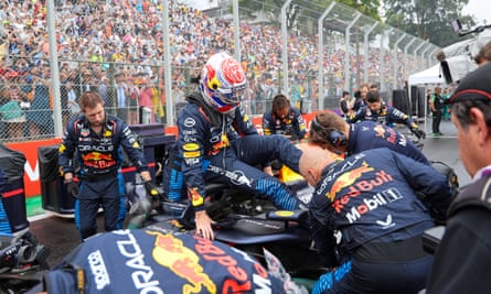 Jon Caller (left) gets to work after Max Verstappen’s victory in the São Paulo Grand Prix