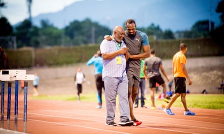 The other star of the show … Usain Bolt wth his coach Glen Mills.