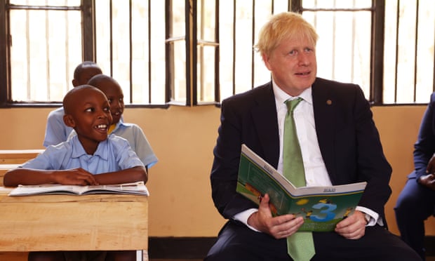 Boris Johnson attends a lesson during a visit to GS Kacyiru II school in Kigali, Rwanda.
