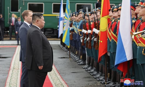 Kim Jong-un reviews a guard of honour in Vladivostok, Russia, during a send-off ceremony at the end of his six-day visit to the country