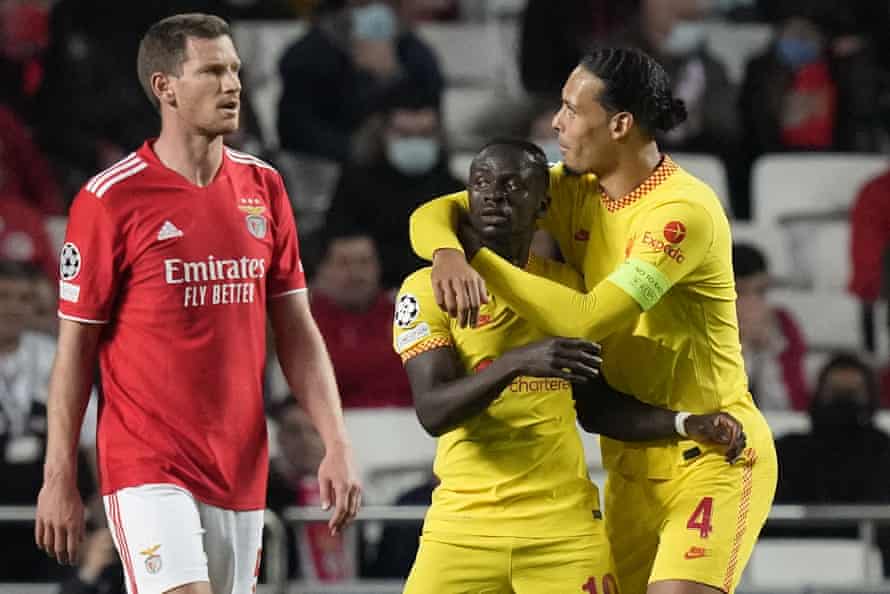 Liverpool’s Sadio Mane, centre, celebrates with Virgil van Dijk after scoring his side’s second goal.