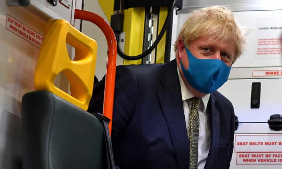 Boris Johnson, wearing a face mask