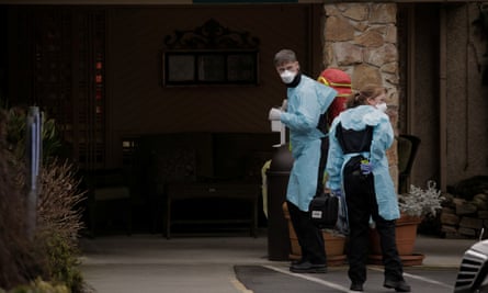Medics outside the Life Care Center in Kirkland, Washington, on 1 March.