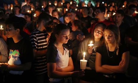People attend a memorial service for the victims of the shooting at Marjory Stoneman Douglas high school in Parkland, Florida, on 15 February 2018.