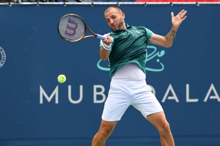 Dan Evans hits a forehand shot.