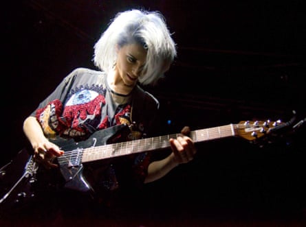 St Vincent on stage in Cambridge, UK, in 2014