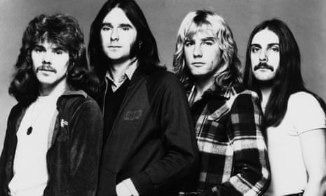 Alan Lancaster, left, with Status Quo in the mid-1970s. From left: Francis Rossi, Rick Parfitt and John Coghlan.