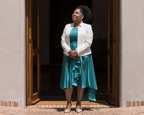 Francia Márquez standing in a doorway looking to her right