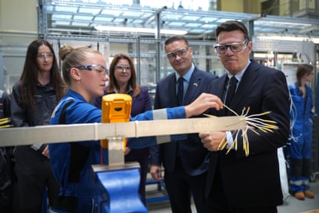 Andy Burnham (right) and defence secretary Wes Streeting (2nd right) during a visit to Submarine Academy for Skills and Knowledge (SASK) at BAE Systems, in Barrow in Furness, Cumbria.