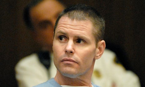 a man looks to the side