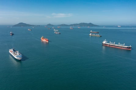 Cargo ships wait at anchor near Panama’s Pacific coast before crossing the canal