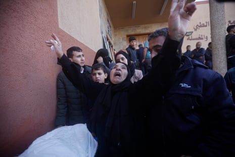 Palestinians mourn relatives killed in the Israeli bombardment of the Gaza Strip in Khan Younis.