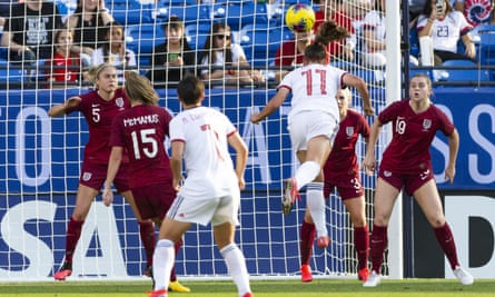 England captain Steph Houghton (left) can only watch as Spain’s Alexia Putellas powers a header in from a corner.