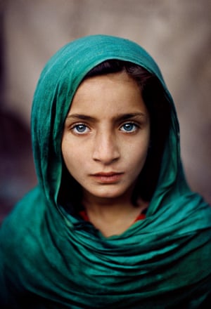Peshawar, Pakistan, 2002: An Afghan refugee girl in a green headscarf.