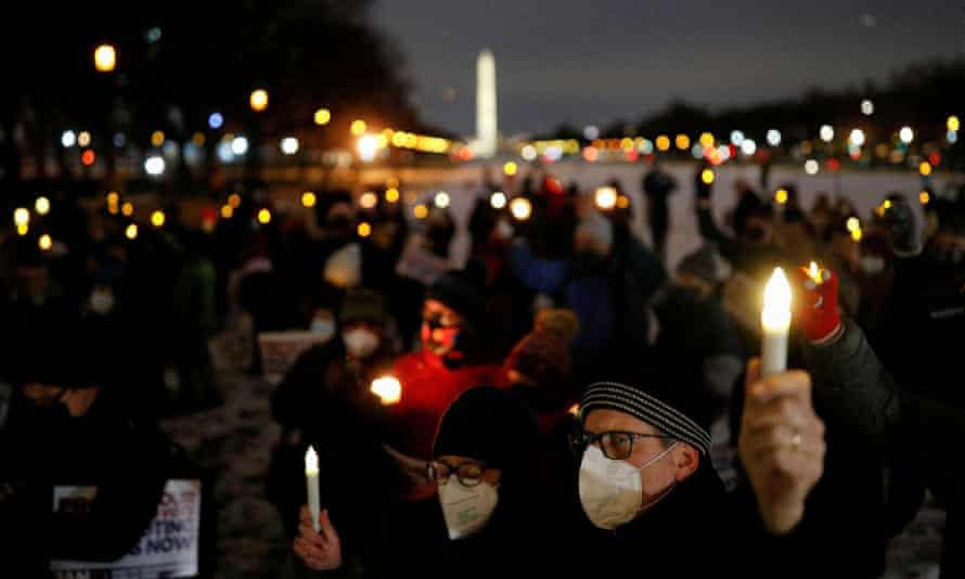 A candlelight vigil on the National Mall on the first anniversary of the attack on the Capitol.