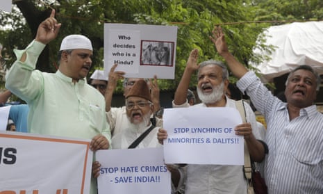 Indian activists protest against this week’s attack on the social activist Swami Agnivesh in Mumbai.