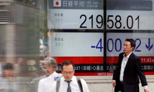 A stock market indicator board in Tokyo on Wednesday.