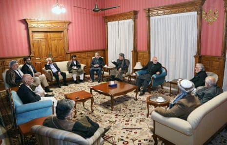A group of 12 political leaders are seen at the presidential palace in Afghanistan
