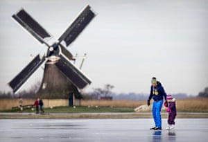 Ryptsjerk, NetherlandsSkating enthusiasts skate on natural ice in the Frisian Ryptsjerkerpolder pond. People enjoy skating on natural ice in Netherlands after sub zero temperatures were noted during nights in the last days