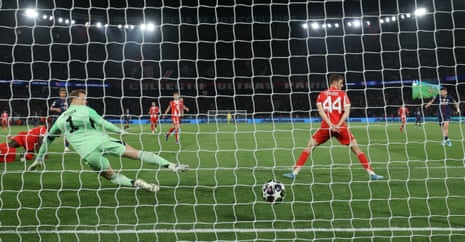 Bayern Munich keeper Manuel Neuer looks on as he fails to save a shot from Khvicha Kvaratskhelia which was Paris Saint-Germain's fourth goal.