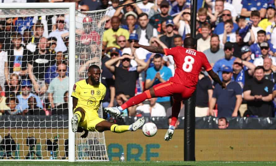 Liverpool's Naby Keita shoots on sight under pressure from Chelsea's Antonio Rudiger.