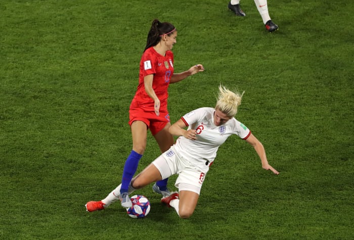 Millie Bright of England fouls Alex Morgan of the USA, leading to a second yellow, and therefore a red card.