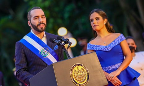 El Salvador's President Nayib Bukele with a woman to his left